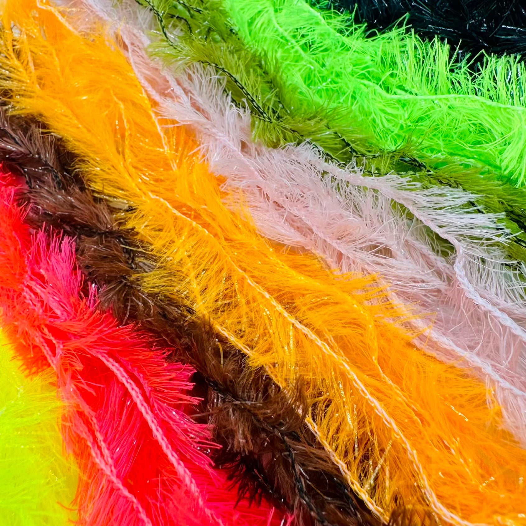 Upavon Pure Colour Straggle Hackle for fly tying, featuring colorful feather material from UPAVON FLY FISHING.