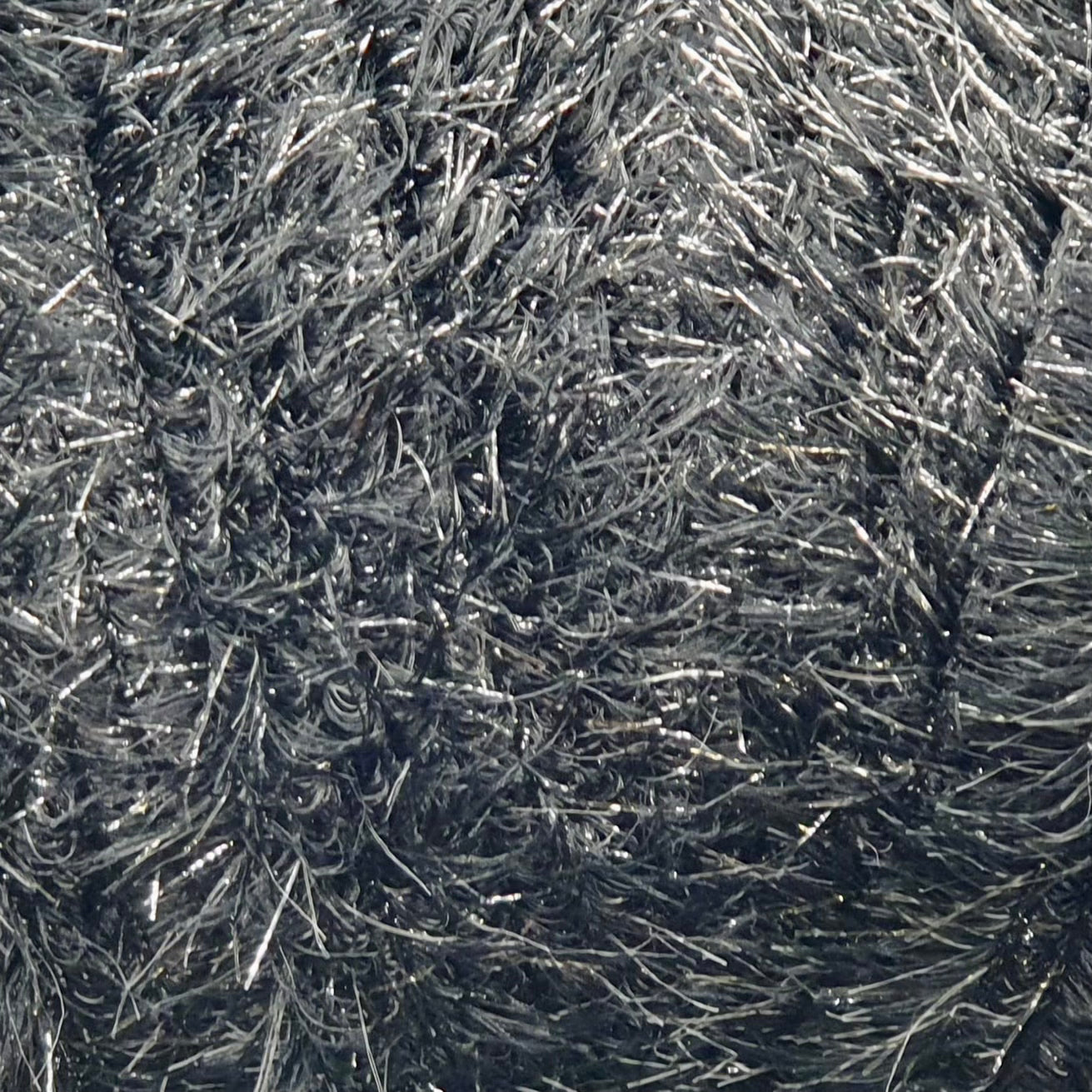 Upavon Pure Colour Straggle Hackle for fly tying, showing vibrant feather fibers used in fly fishing lures.