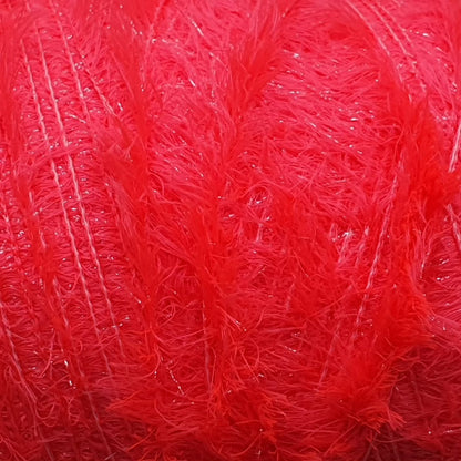 Close-up of Upavon Pure Colour Straggle Hackle fly tying material, showcasing vibrant feather fibers for fishing lures.
