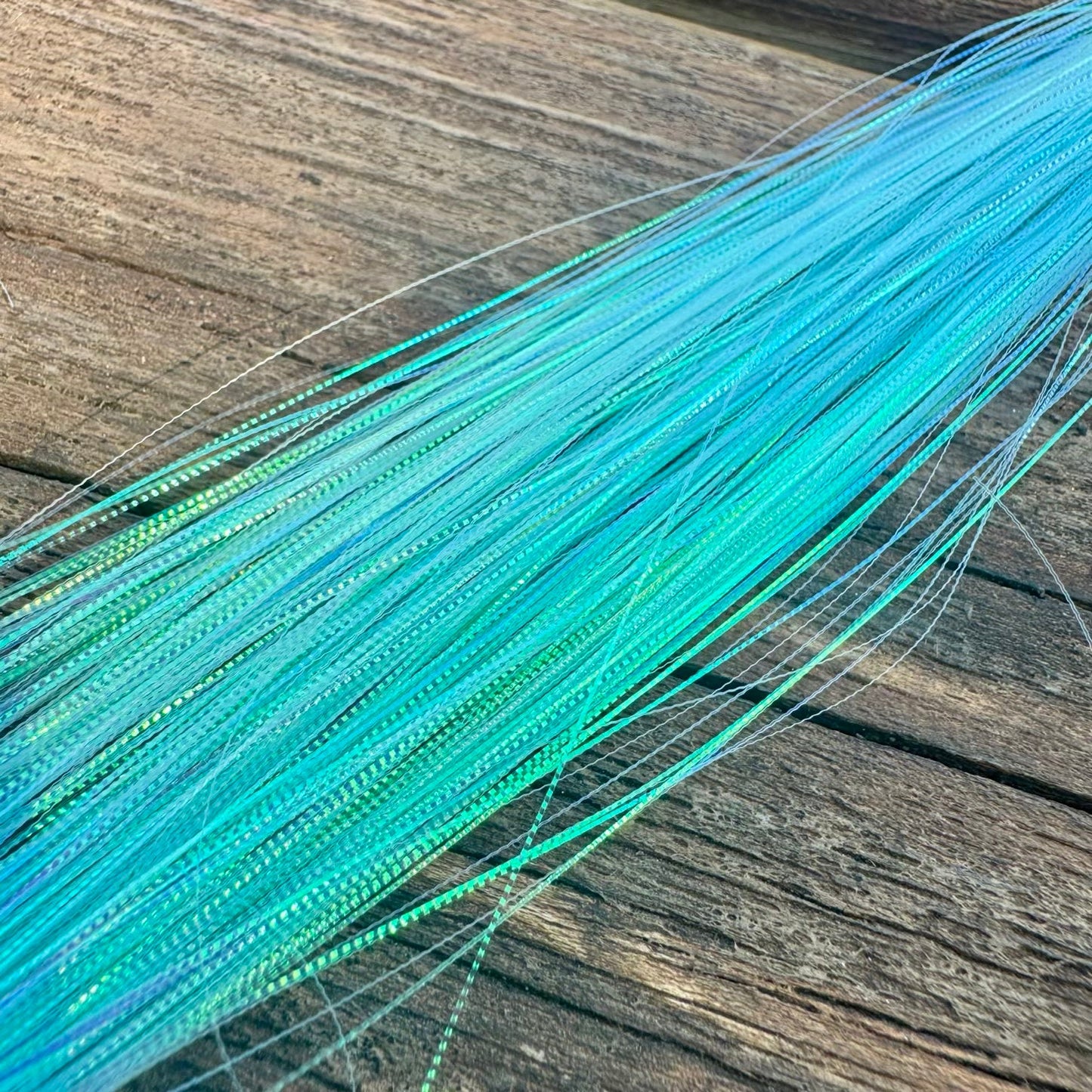 Upavon Apex Predator Micro Scale Flash for fly tying, featuring iridescent micro-scale material for realistic fish fly patterns.