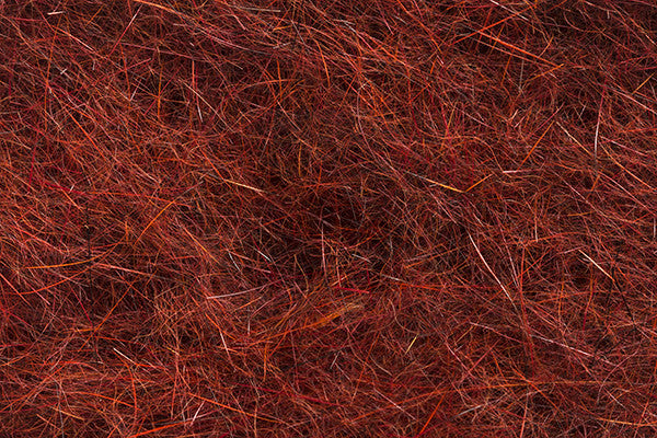 Troutline Mad Rabbit Dubbing Plus UV in hot orange for fly tying, showing soft, textured fly tying material for fishing lures.