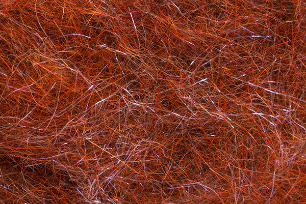 Orange Mad Rabbit Dubbing Plus fly tying material by Troutline, UV-reactive and fluffy for realistic fly patterns.
