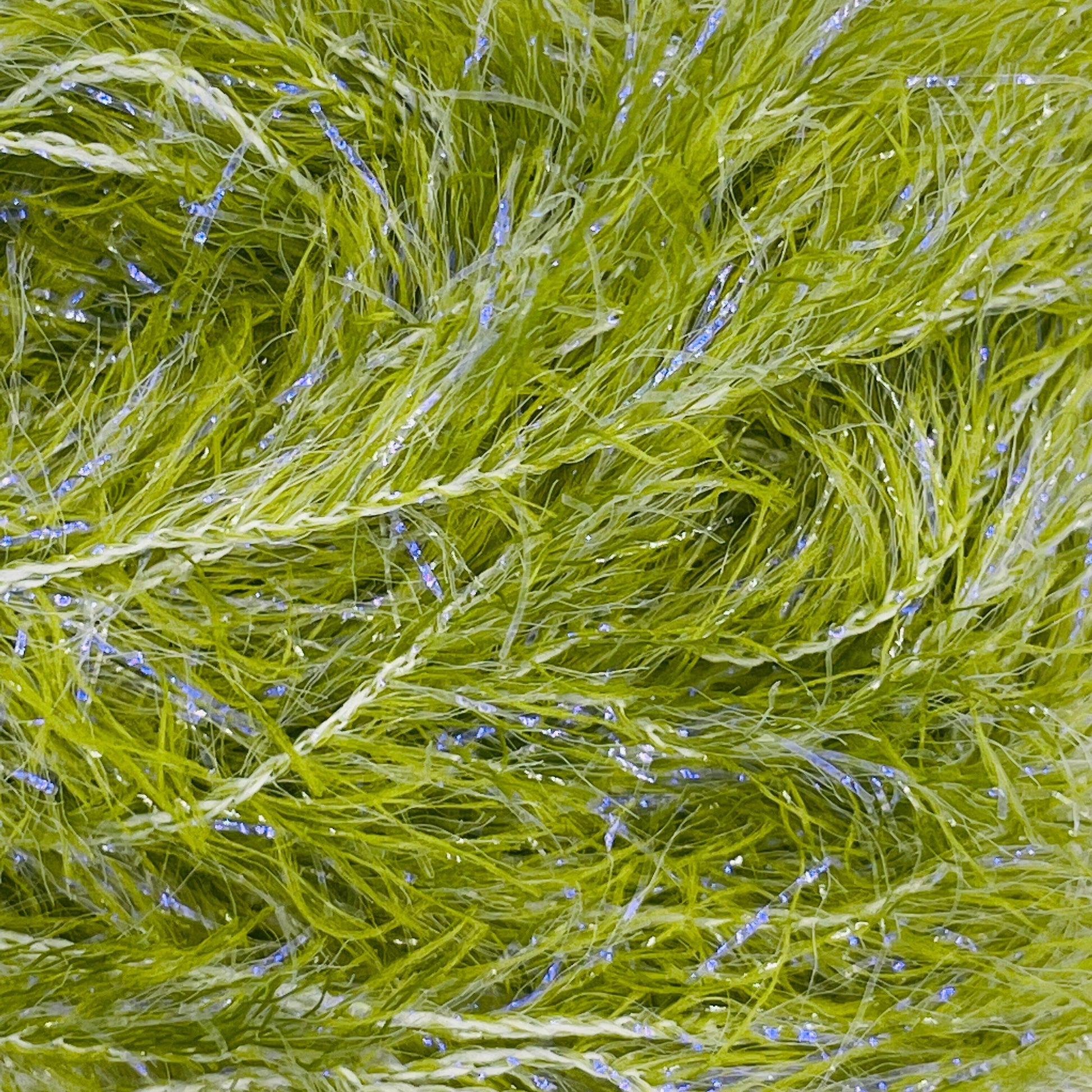 UV Boosted Straggle Hackle for fly tying by UPAVON FLY FISHING, orange and UV-boosted fly tying material with 4mm fibers.